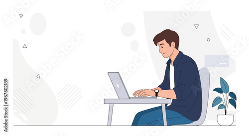 Young man working on a laptop at a desk, modern office, plant, focused on work