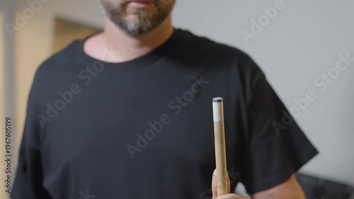 Close-up of a Man Playing Billiards and Pocketing a Ball