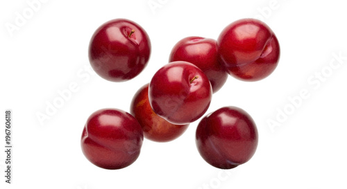 Group of fresh ripe red plums on a transparent background
