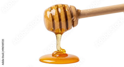 Honey dripping from a wooden honey dipper on a transparent background