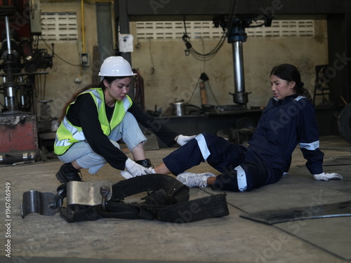 Accident at work of construction worker at site. Safety team helps employee accident.