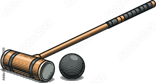 A wooden mallet and a black ball on a plain surface