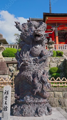 Kyoto, Japan - Oct 11 2024, 4k, Vertical close-up view of the stone statue of intertwined eastern dragons at the entrance to Kiyomizu-dera Temple, wirhout people, at daytime, Kyoto, Japan