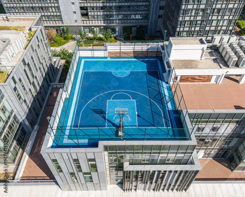 Basketball courts in modern city on rooftop
