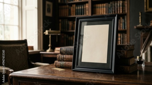 Wallpaper Mural Blank frame on wooden desk surrounded by antique books in warm library near window Torontodigital.ca