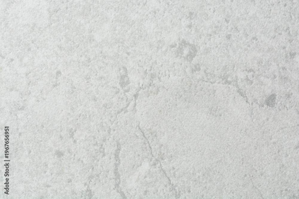 Fototapeta premium closeup view of close up textured stone countertop, white stone tile countertop with grey veins