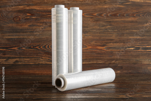 Rolls of stretch wrap on wo...