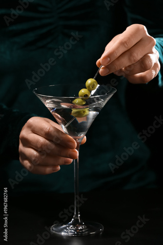 Female hands with olives an...
