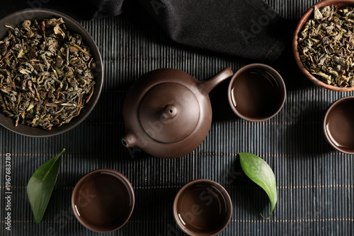 Oriental teapot, cups and l...