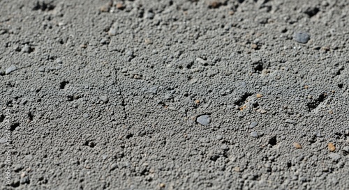 Close-up of Textured Concrete Surface with Gravel