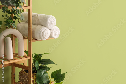 Shelf with clean towels and...