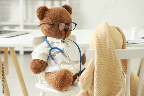 Toy bear dressed as doctor ...