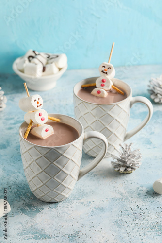 Cups of hot chocolate with ...