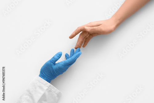 Hands of female doctor and ...