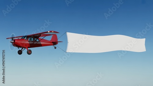 Red airplane towing an empty white banner across a clear blue sky for advertising, marketing, and promotional messages.