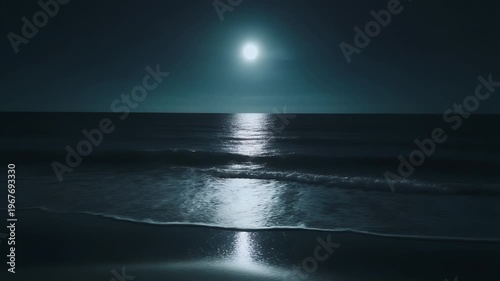 Luminous Full Moon Over Serene Night Seaside Gentle Waves Caress Shore with Silvery Ocean Path