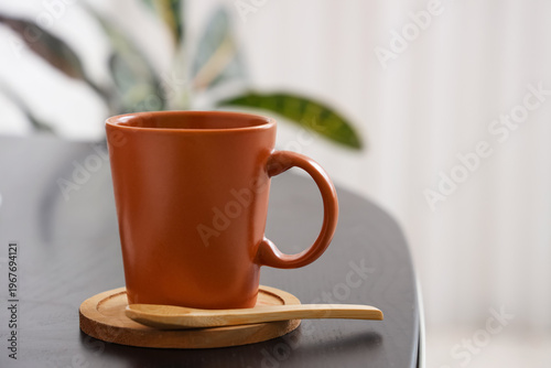 Cup of coffee with wooden c...