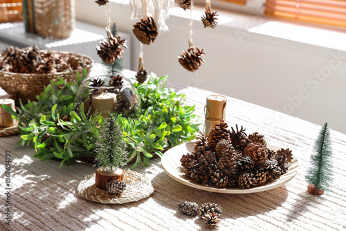 Coniferous cones with candl...
