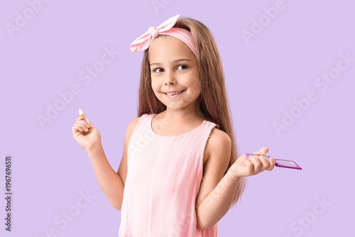 Cute little girl with mirro...