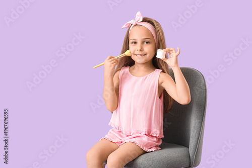 Cute little girl with jar o...