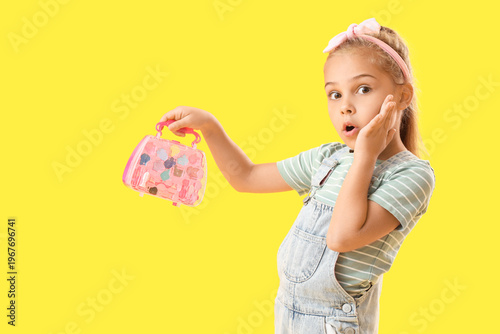 Surprised little girl with ...