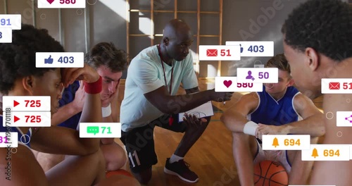 Sports coach kneeling pointing board team refocusing as incoming social icons rising then clearing