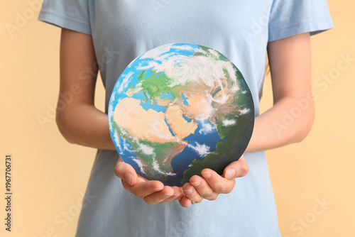 Young woman with paper plan...