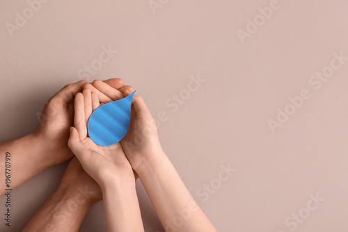 Female hands with paper wat...
