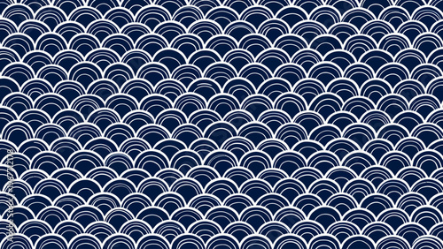 Seamless traditional japanese wave pattern in dark blue and white for classic oriental textiles ocean motif backgrounds and elegant asian decor design.