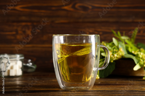 Glass cup of hot linden tea...
