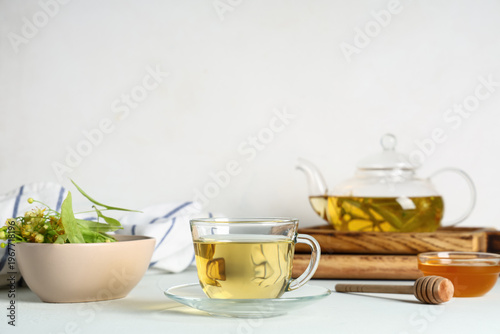 Glass cup of hot linden tea...