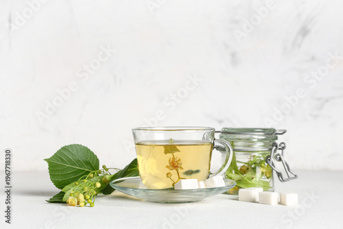 Glass cup of hot linden tea...
