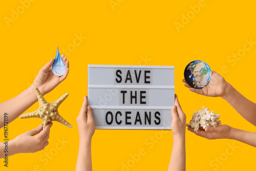 Hands holding lightbox with...