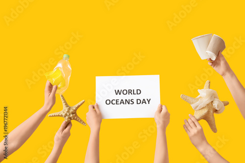 Hands holding paper sheet w...