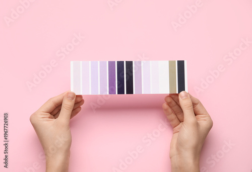Female hands with violet pa...
