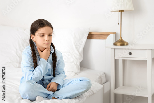 Cute girl suffering from so...