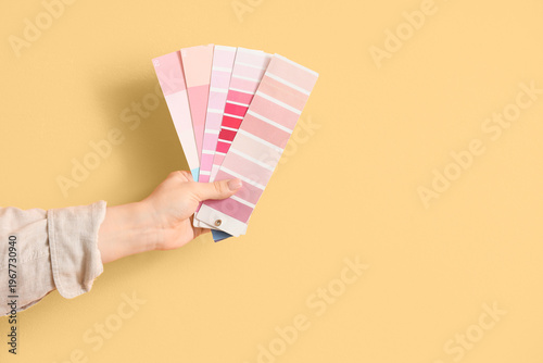 Female hand with pink color...