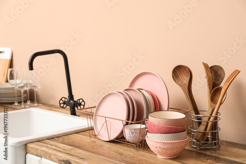 Holder with clean pink plat...