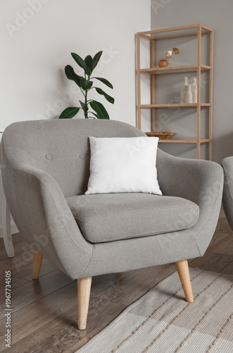 Modern grey armchair with c...