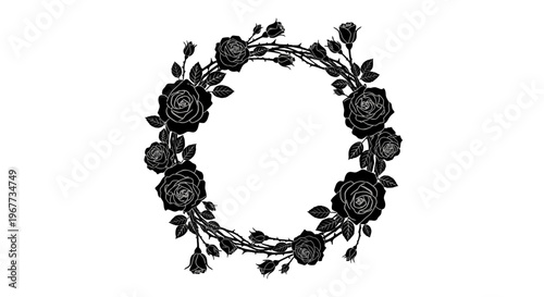 Black floral wreath with roses and leaves.
