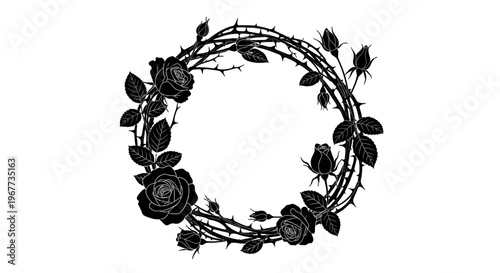 Black floral wreath with roses and leaves.