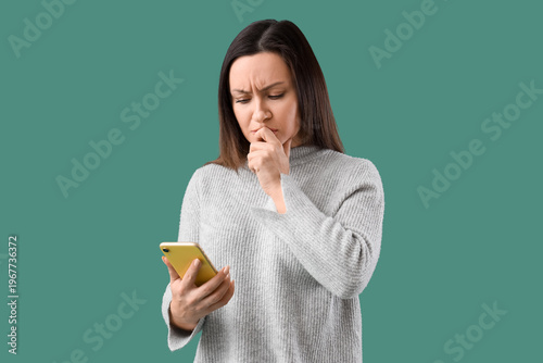 Worried woman with mobile p...