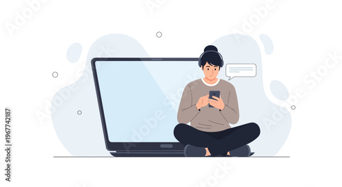 Young person with headphones using smartphone, sitting cross-legged next to a laptop