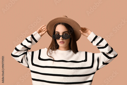 Beautiful young woman in st...