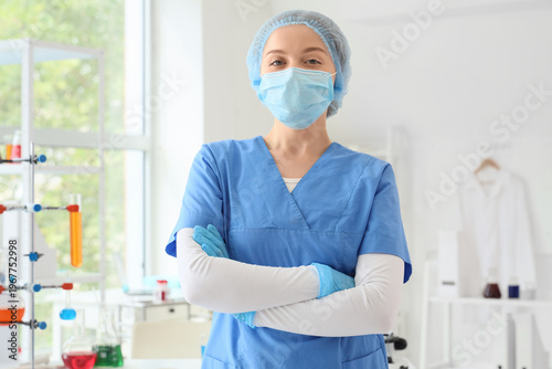 Portrait of female chemist in laboratory