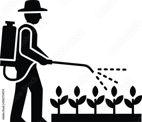Farmer or gardener spraying plants with backpack sprayer for pest control with food production with plant care
