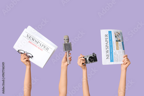 Female hands with newspaper...