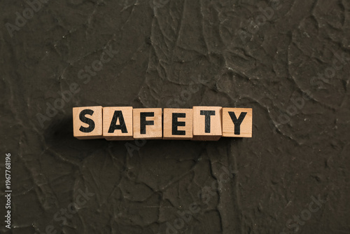 Wooden cubes with word SAFE...