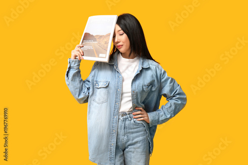 Young Asian woman holding t...