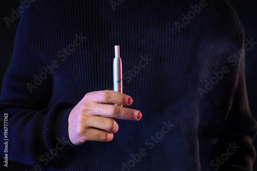 Young man with electronic c...